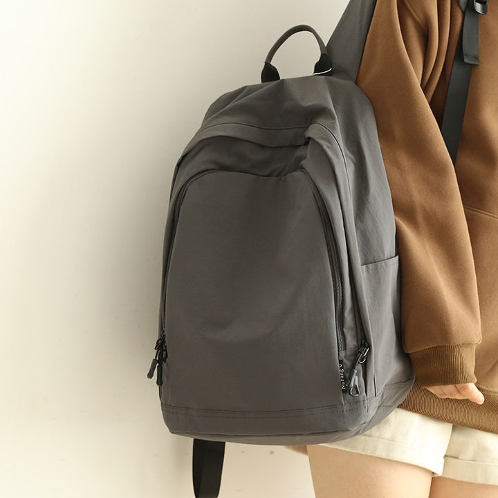 Practical everyday backpack with reinforced bottom and versatile compartments Kalsten
