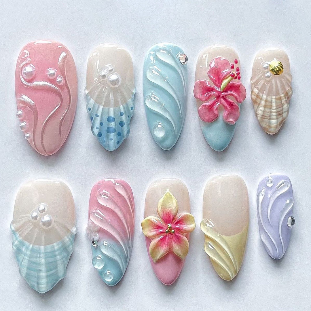 Artificial nail set with floral and shell-shaped designs Kalsten