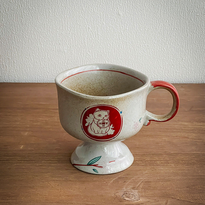 Ceramic foot mug with handle and hand-painted rabbit illustration