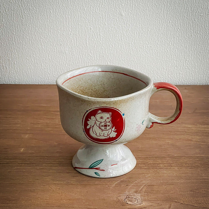Ceramic foot mug with handle and hand-painted rabbit illustration
