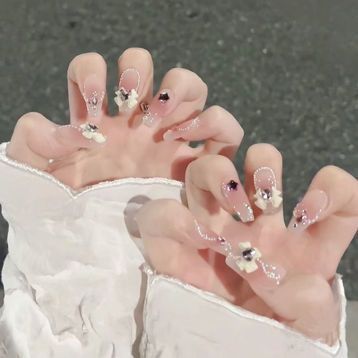Artificial nails with floral accents Kalsten