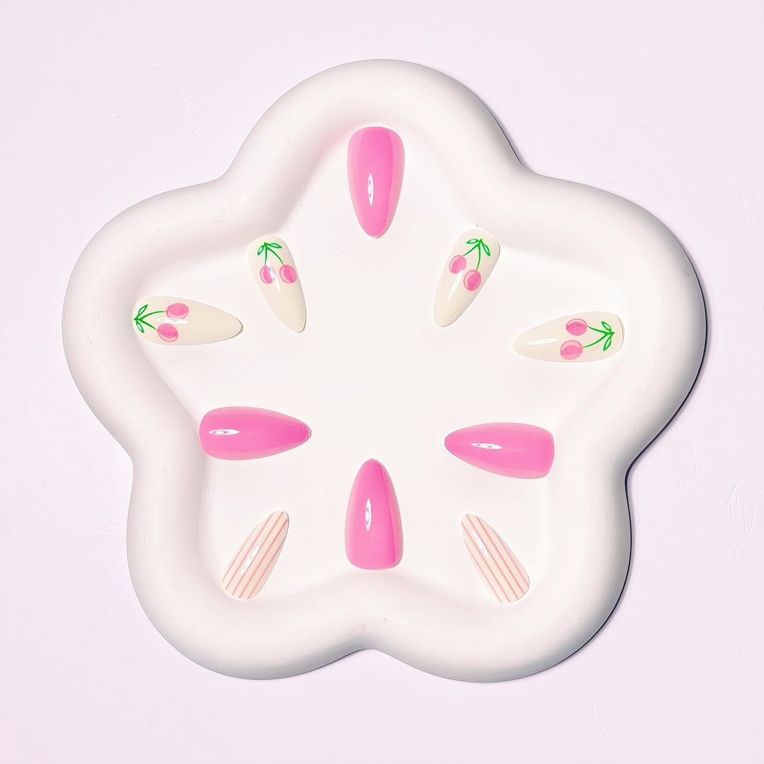 Artificial nails with fruity cherry design and striking colors Kalsten