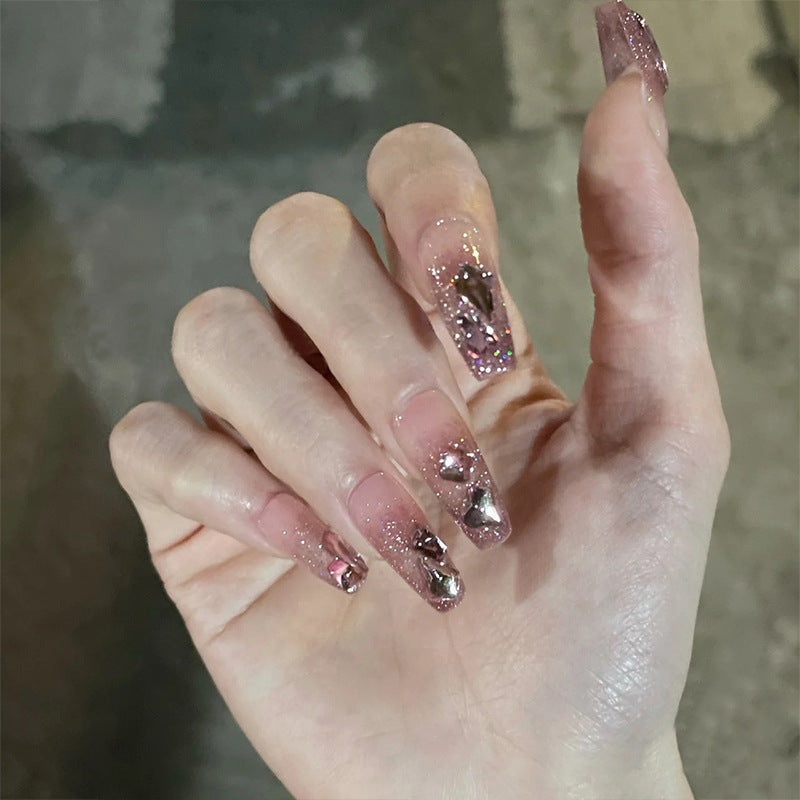 Glamorous artificial nails with sparkling accents Kalsten