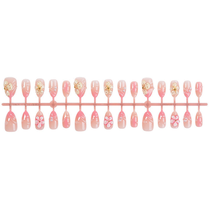 Acrylic nail set with creative floral accents Kalsten