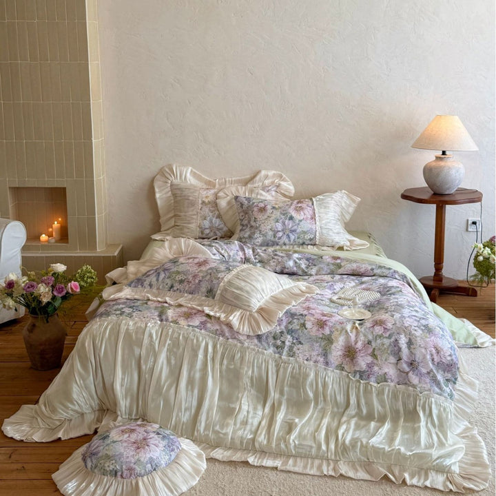 Romantic satin bedding set with floral pattern, ruffle and round cushion