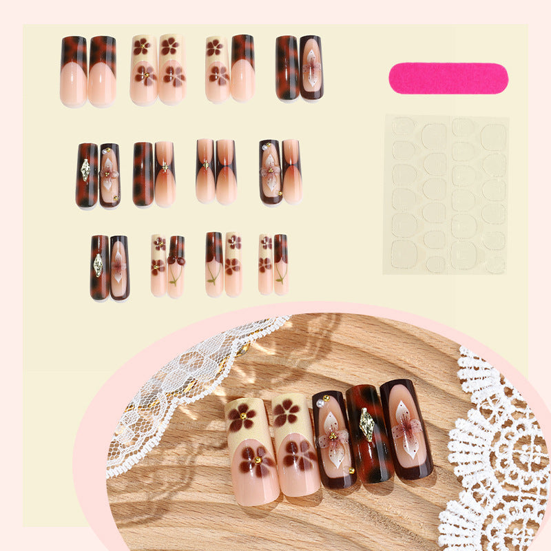 Nail set with floral accents and glitter accents Kalsten