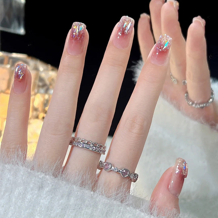 Glamorous artificial fingernails with glitter and moon designs Kalsten