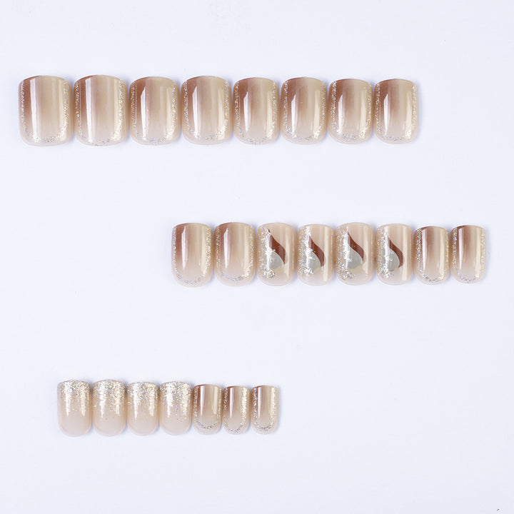 Elegant Nail Art with Glitter and Stylish Accents Kalsten