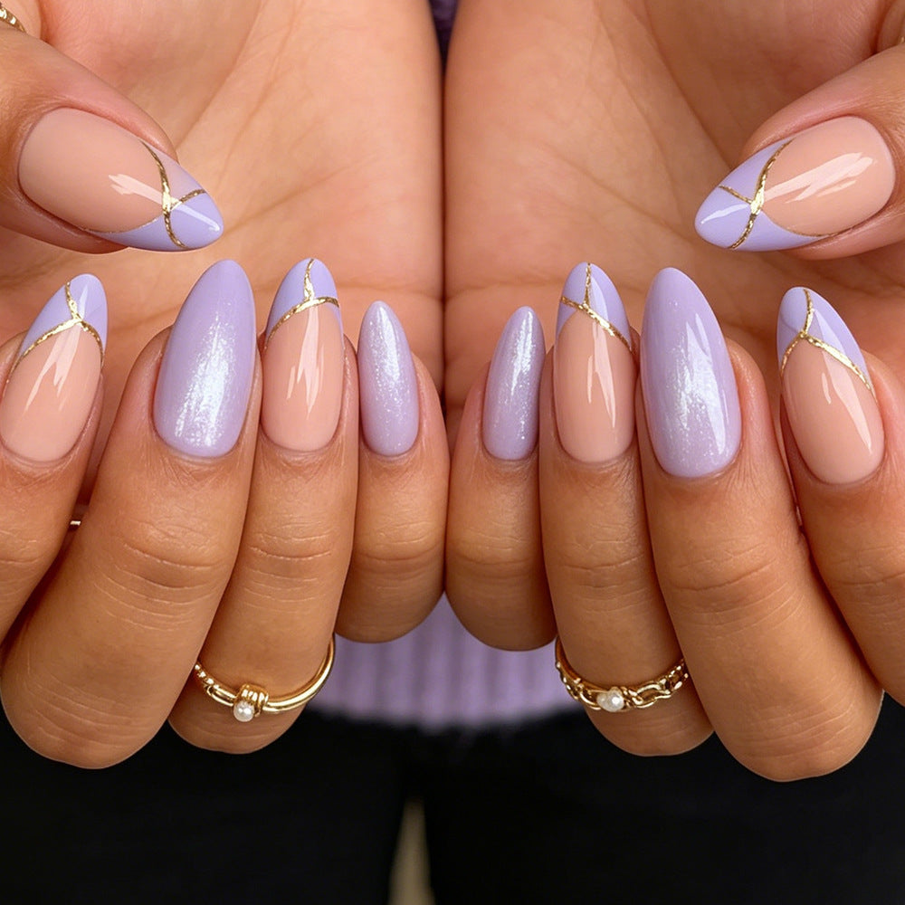 Stiletto Nail Art Tips with Gold Accents Kalsten
