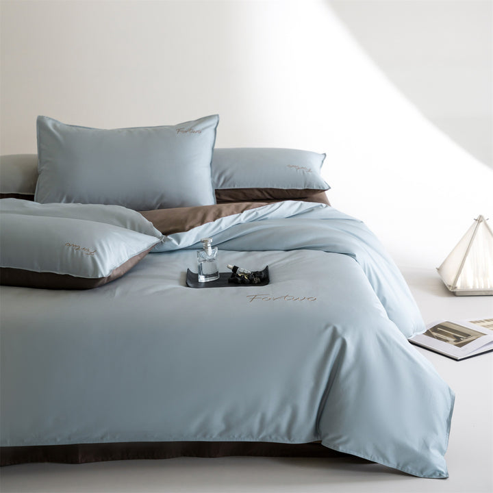 Reversible satin bedding set with fine tone-on-tone embroidery