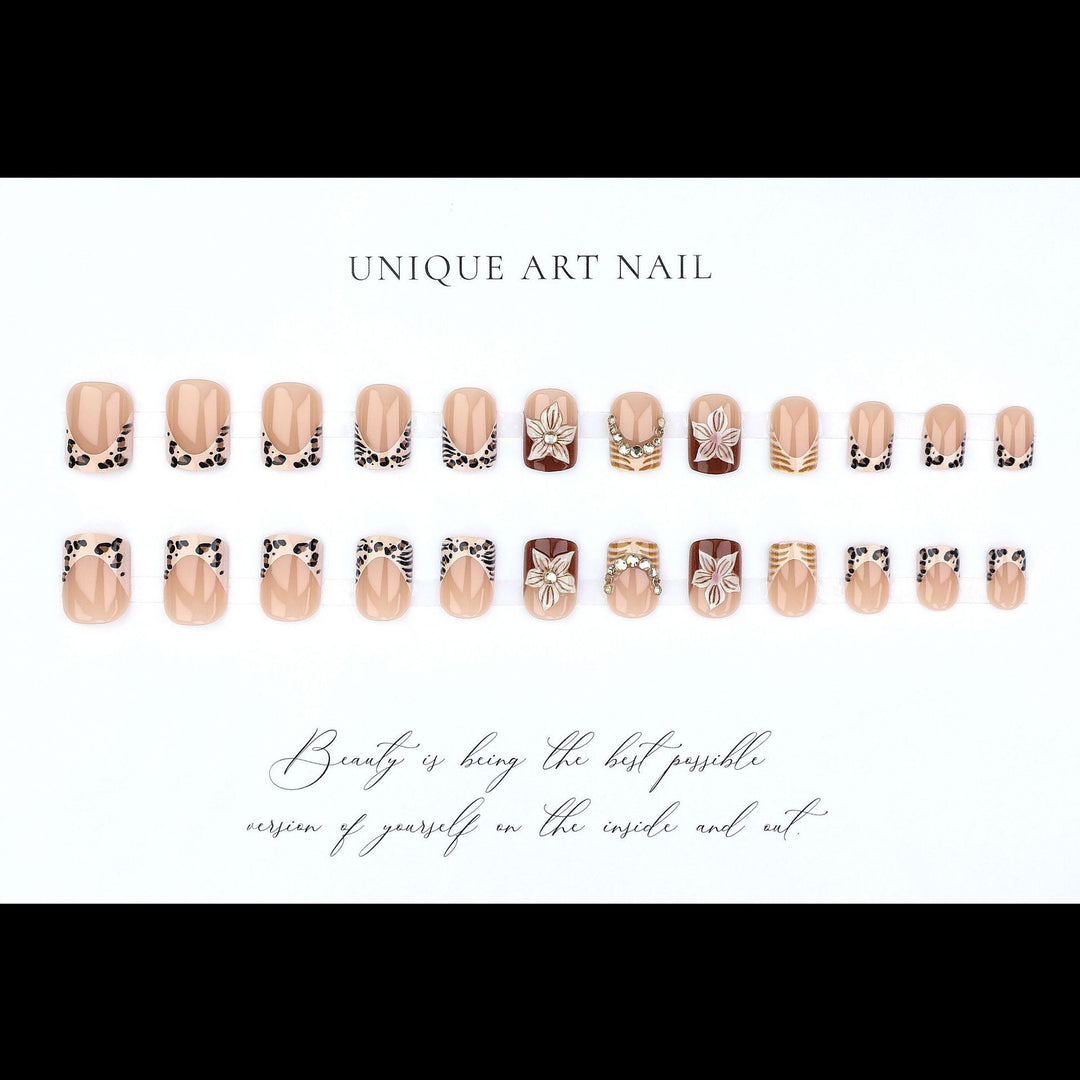 Artificial nail set with floral embellishments and elegant glitter details Kalsten