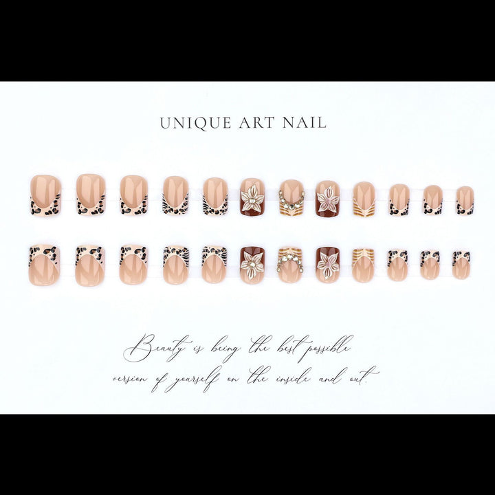 Artificial nail set with floral embellishments and elegant glitter details Kalsten