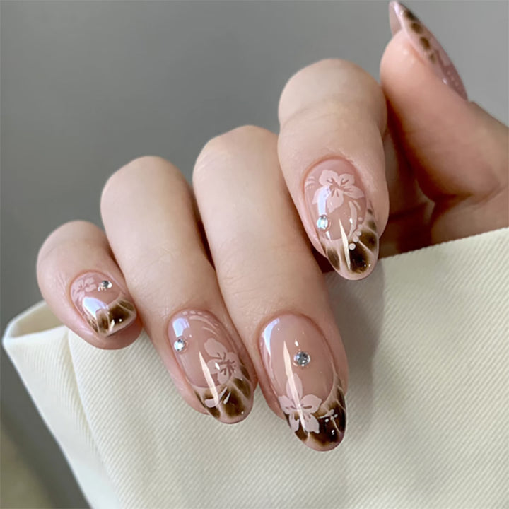 Elegant Artificial Nail Art with Floral Design and Glitter Accents Kalsten