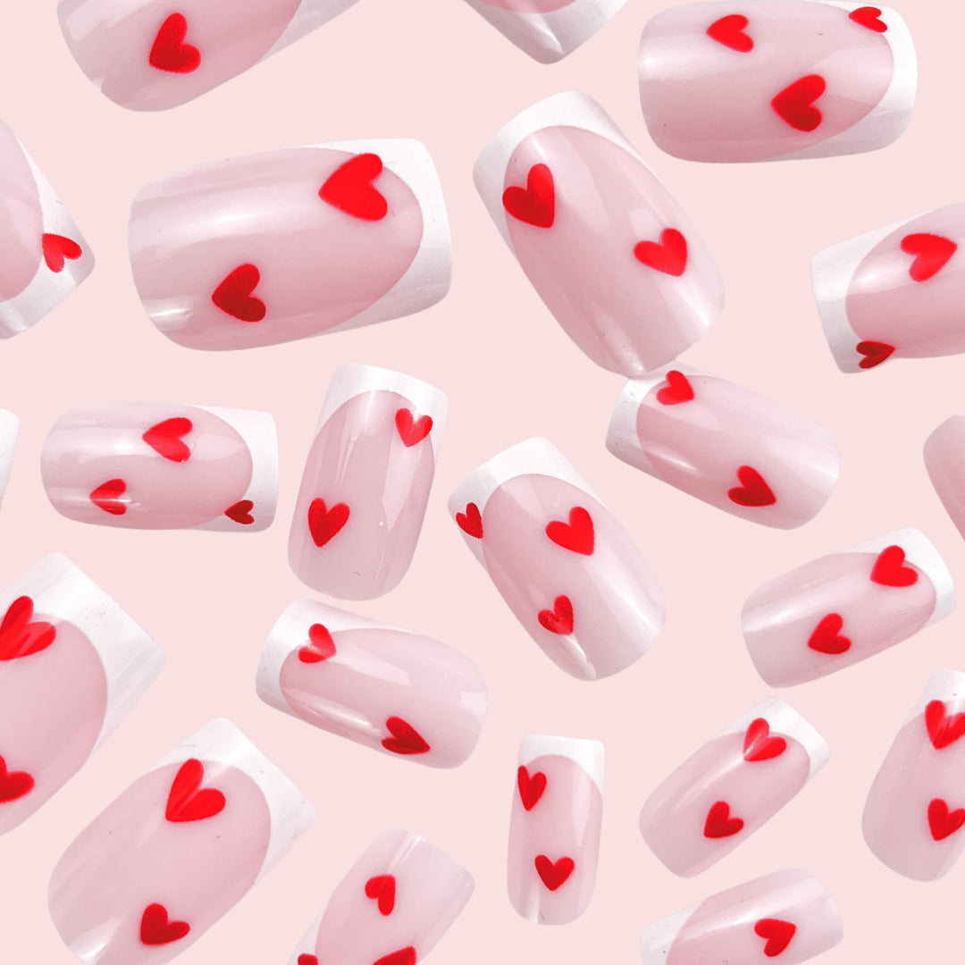 Heart-Embellished French Tip Nail Art Kalsten