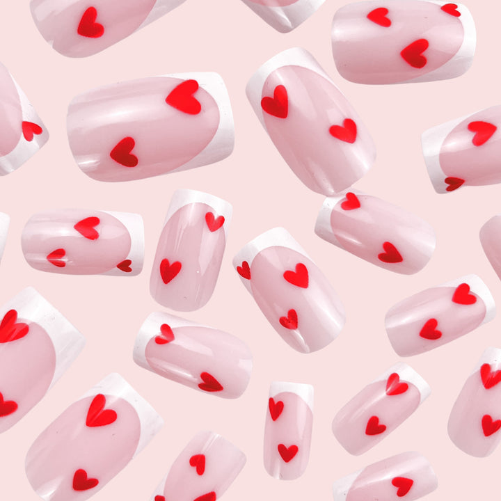 Heart-Embellished French Tip Nail Art Kalsten