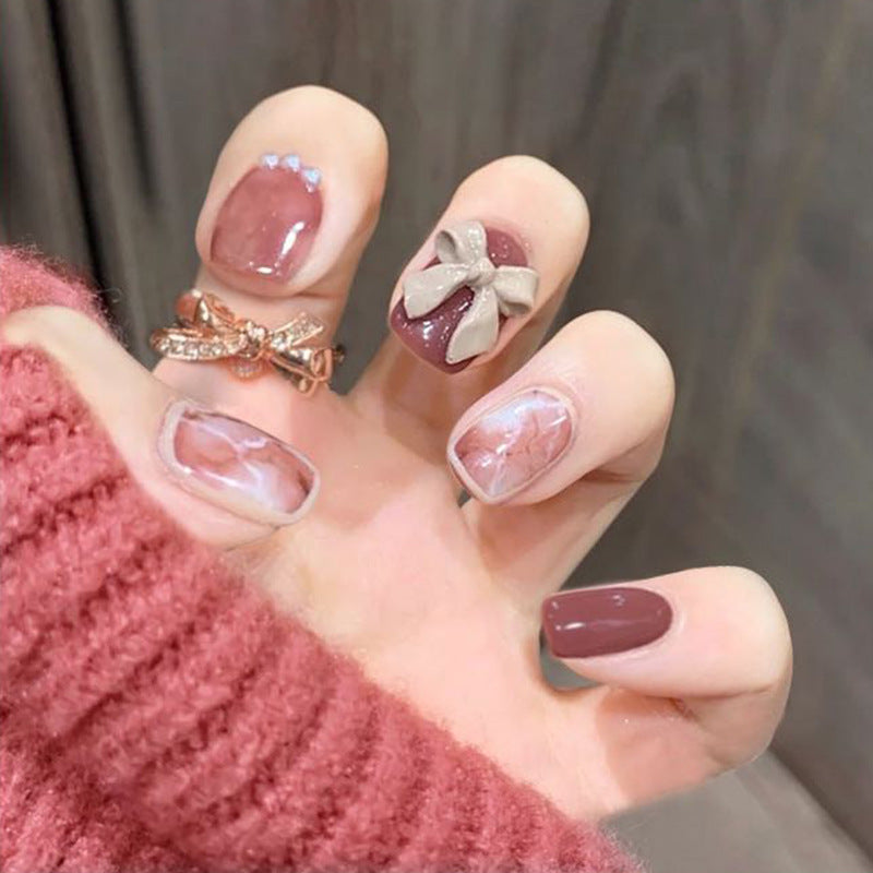 Artful nail art with luxurious 3D bows and elegant accents Kalsten