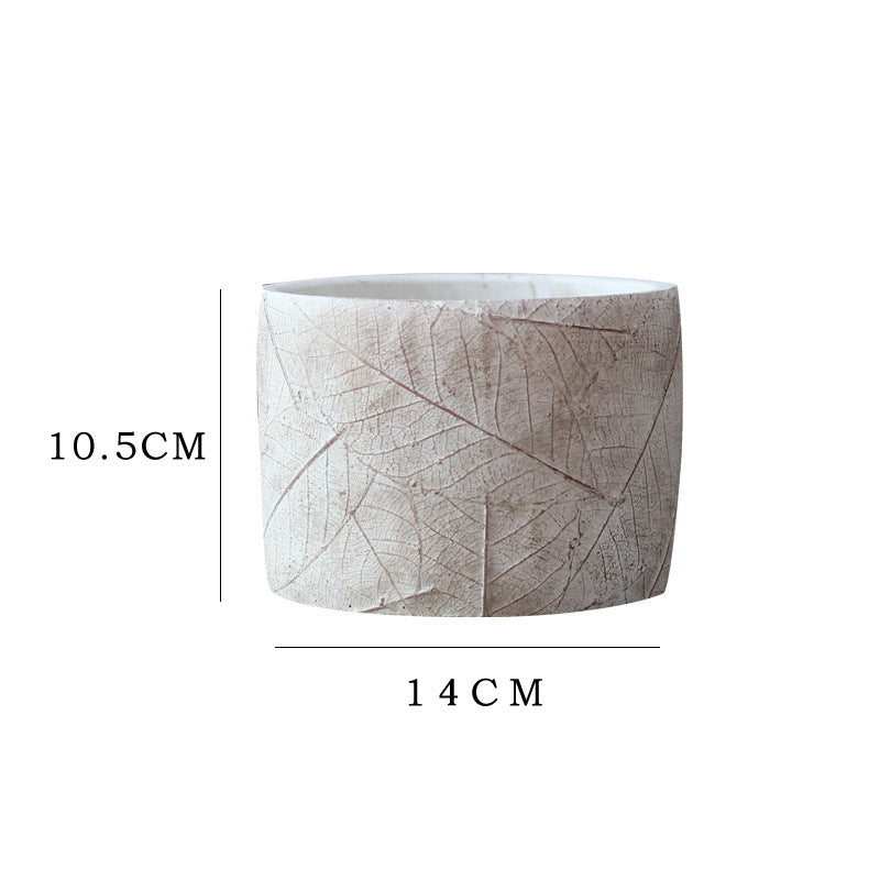 Decorative plant container made of handmade ceramic with leaf pattern Kalsten