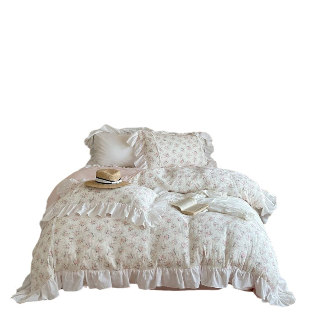 Romantic bedding set made of cotton-linen with delicate ruffles and floral pattern