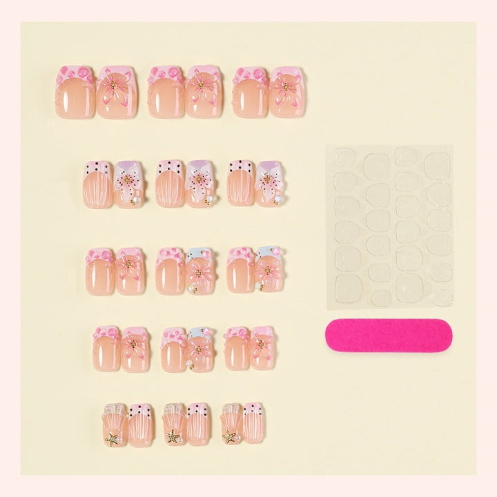 Artificial nail set with floral accents and glamorous decorations Kalsten