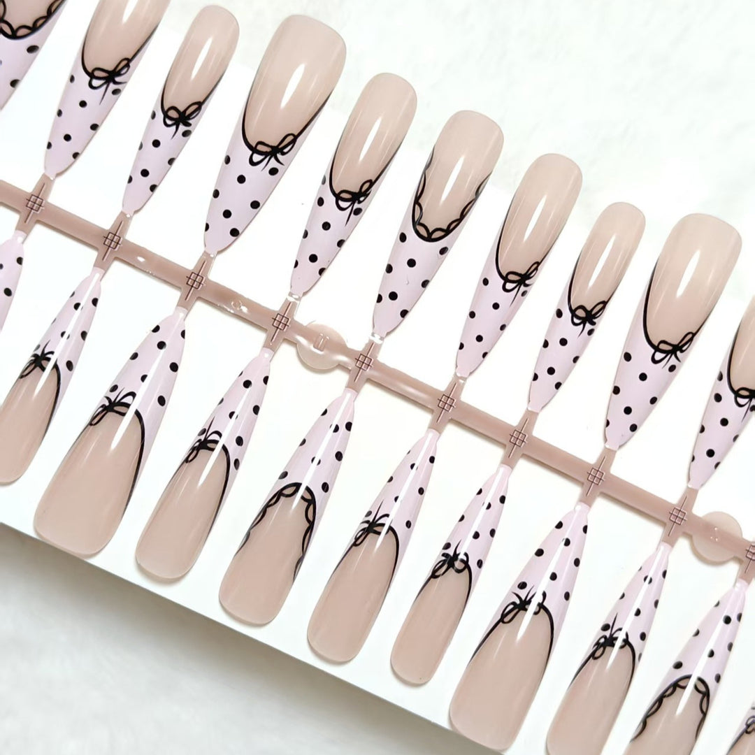 Elegant artificial nails with bow design and dots Kalsten