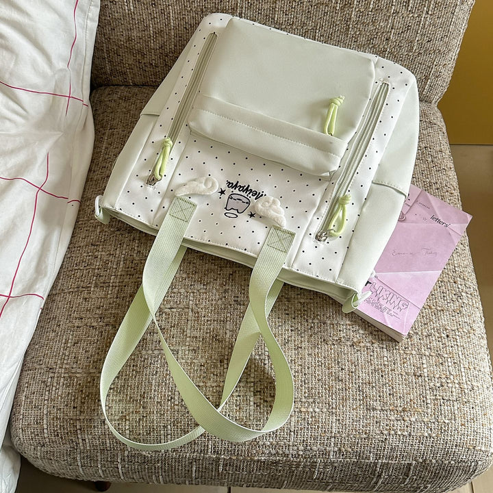 Stylish Dot-Printed Backpack with Decorative Accents Kalsten