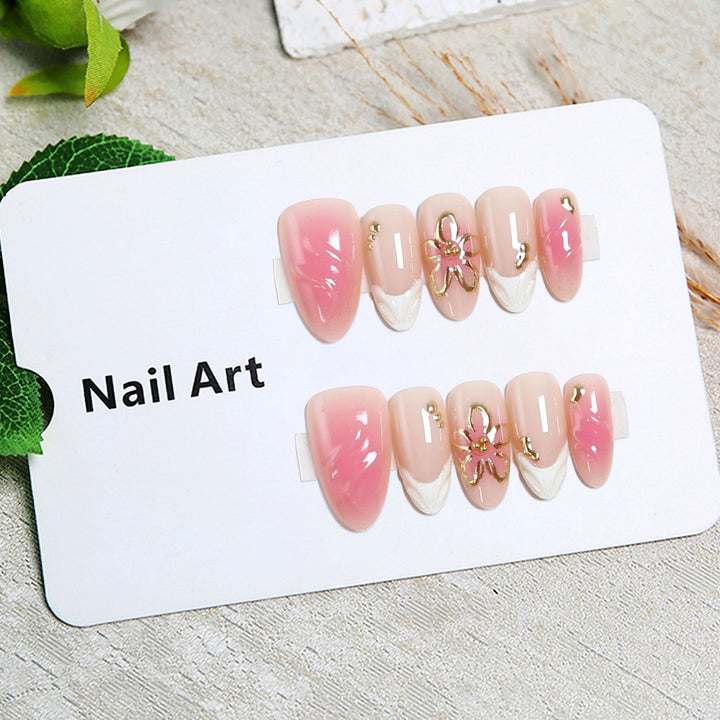 Artificial nails with floral design and glamorous accents Kalsten