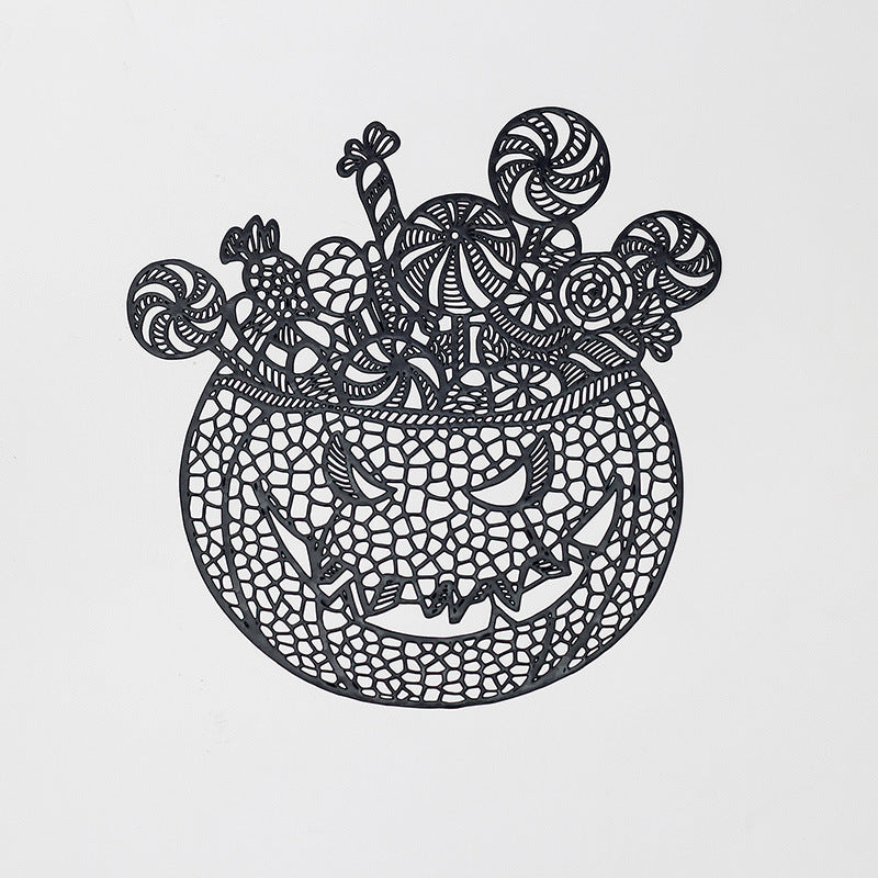 Filigree laser-cut pumpkin placemat made of wood for Halloween table decoration
