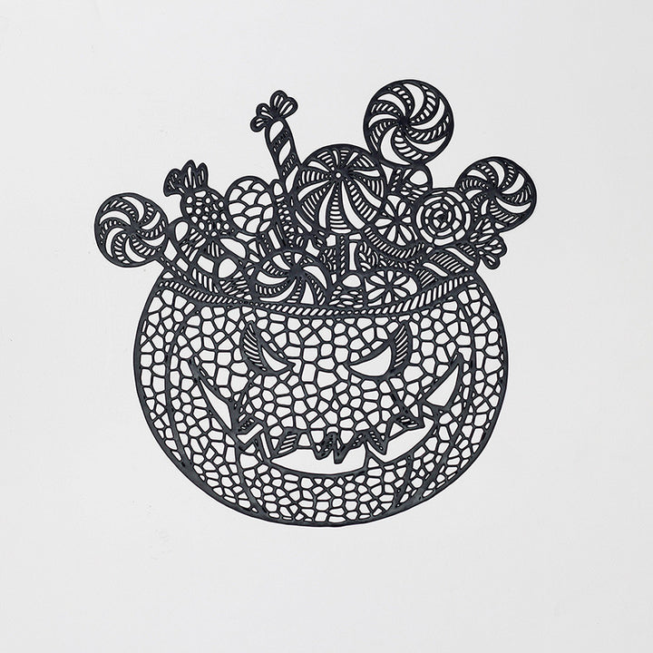 Filigree laser-cut pumpkin placemat made of wood for Halloween table decoration