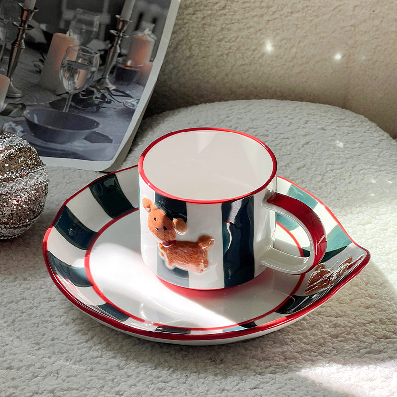 Ceramic cup set with saucer, hand-painted dog motif and wooden spoon