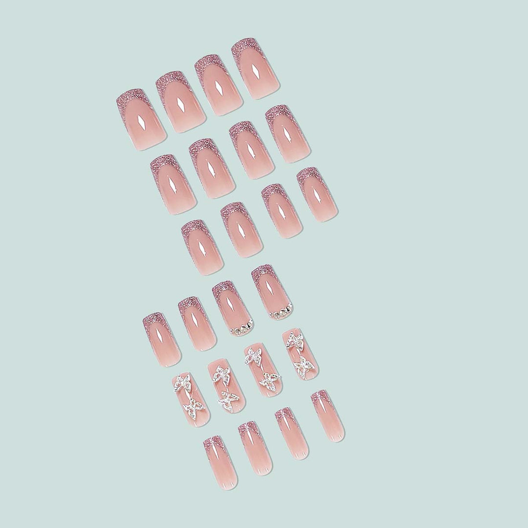 Glamorous stiletto artificial nails with glitter and crystal elements Kalsten