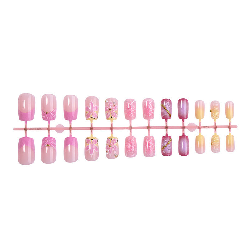 Artificial nail collection with floral design and glitter accents Kalsten