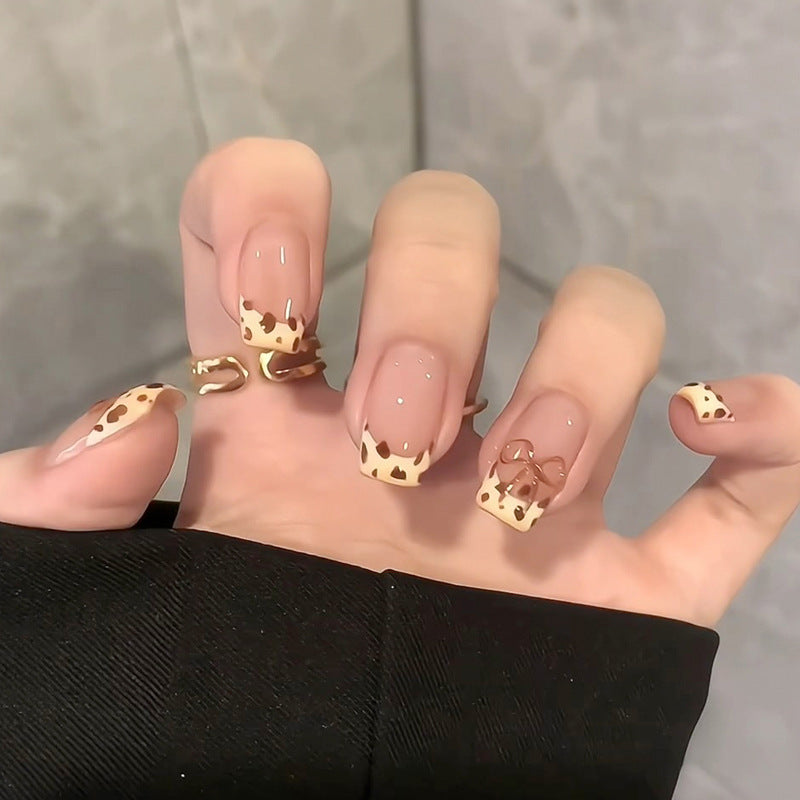Artistic Acrylic Press-On Nails with Decorative Bow Accents Kalsten