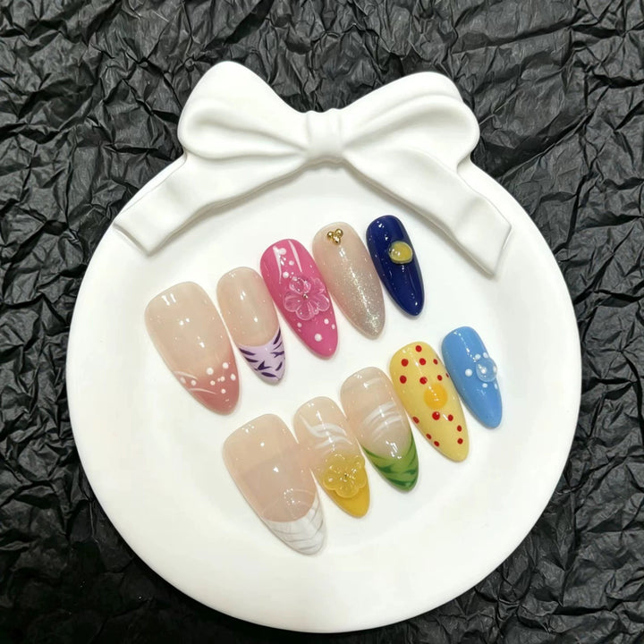 Artistic Press-On Nail Art Set with Floral and Colorful Designs