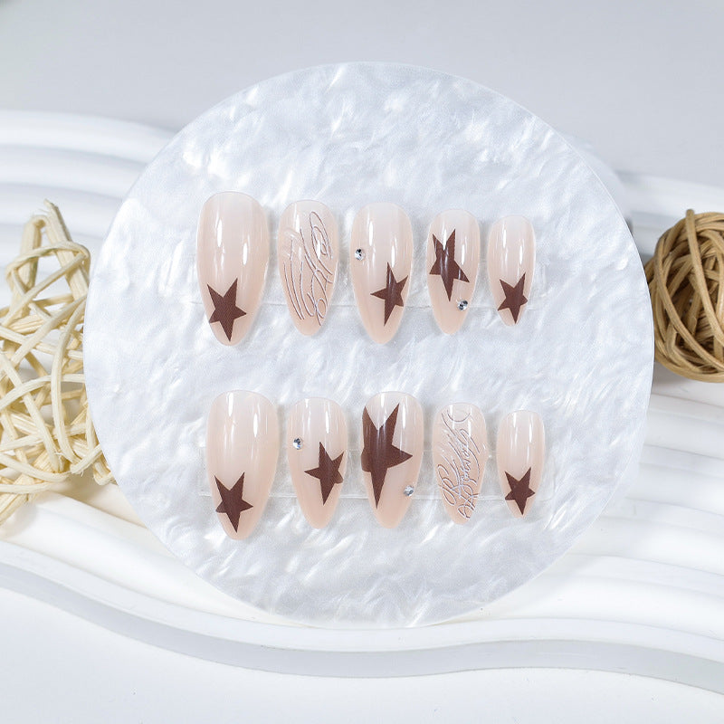 Artificial nail set with elegant star motifs and glitter accents Kalsten