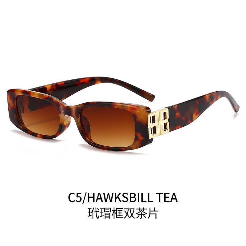 Ladies' fashionable sunglasses with luxurious gold-colored accent Kalsten