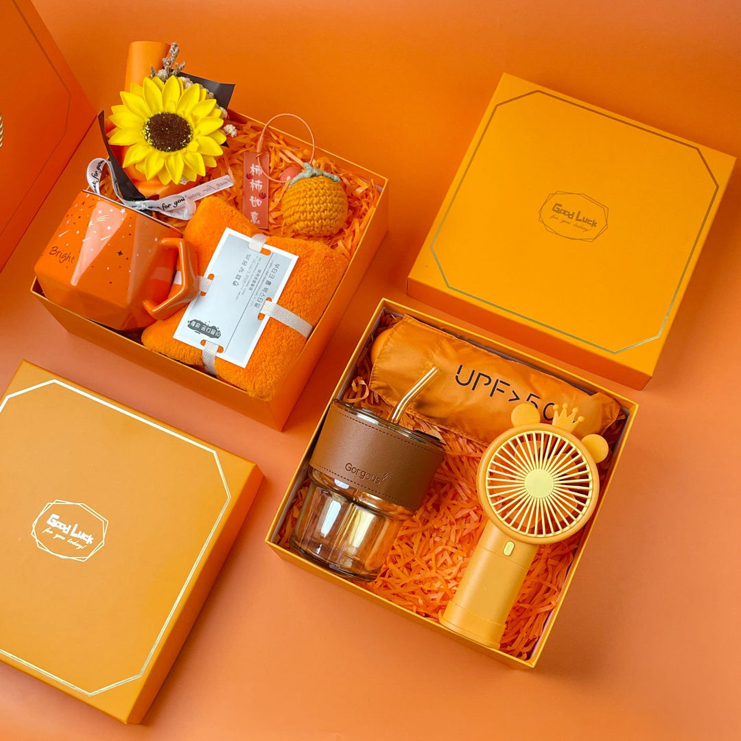Unisex multifunctional gift box with a portable fan, a glass mug, and a towel from Kalsten