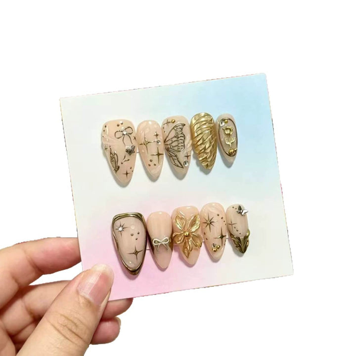 Artistic Press-On Nails Set with Gold and Floral Embellishments