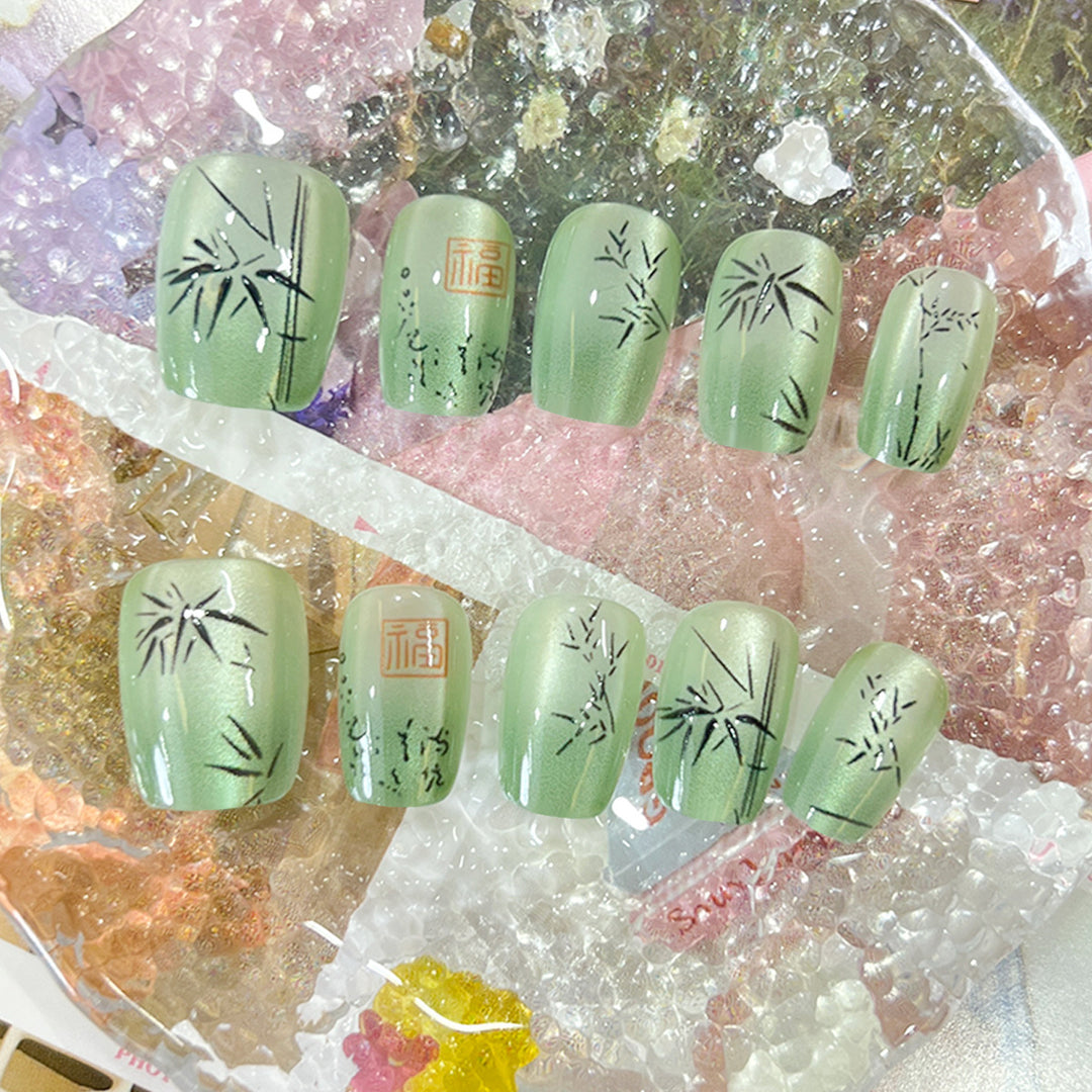 Artistic nail tips with bamboo motif Kalsten
