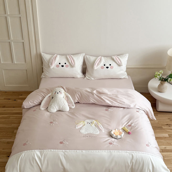 Cozy satin bedding with 3D rabbit appliqués