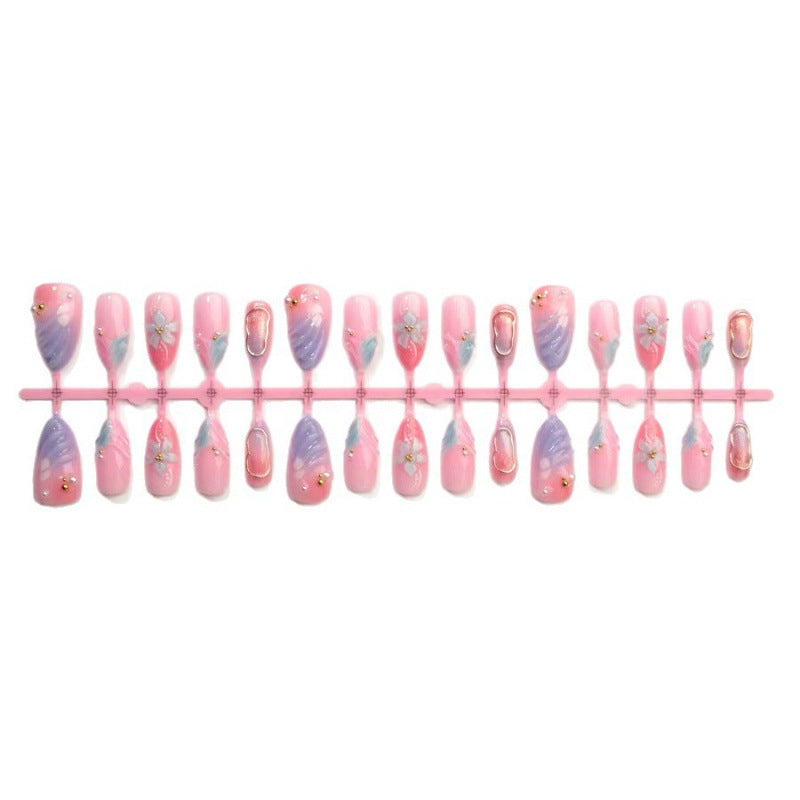 Artificial nails with flower pattern and glamorous accents Kalsten