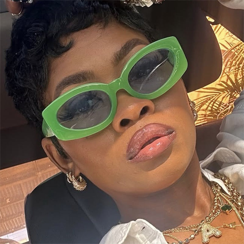 Ladies trendy sunglasses with unique, curved frame Kalsten