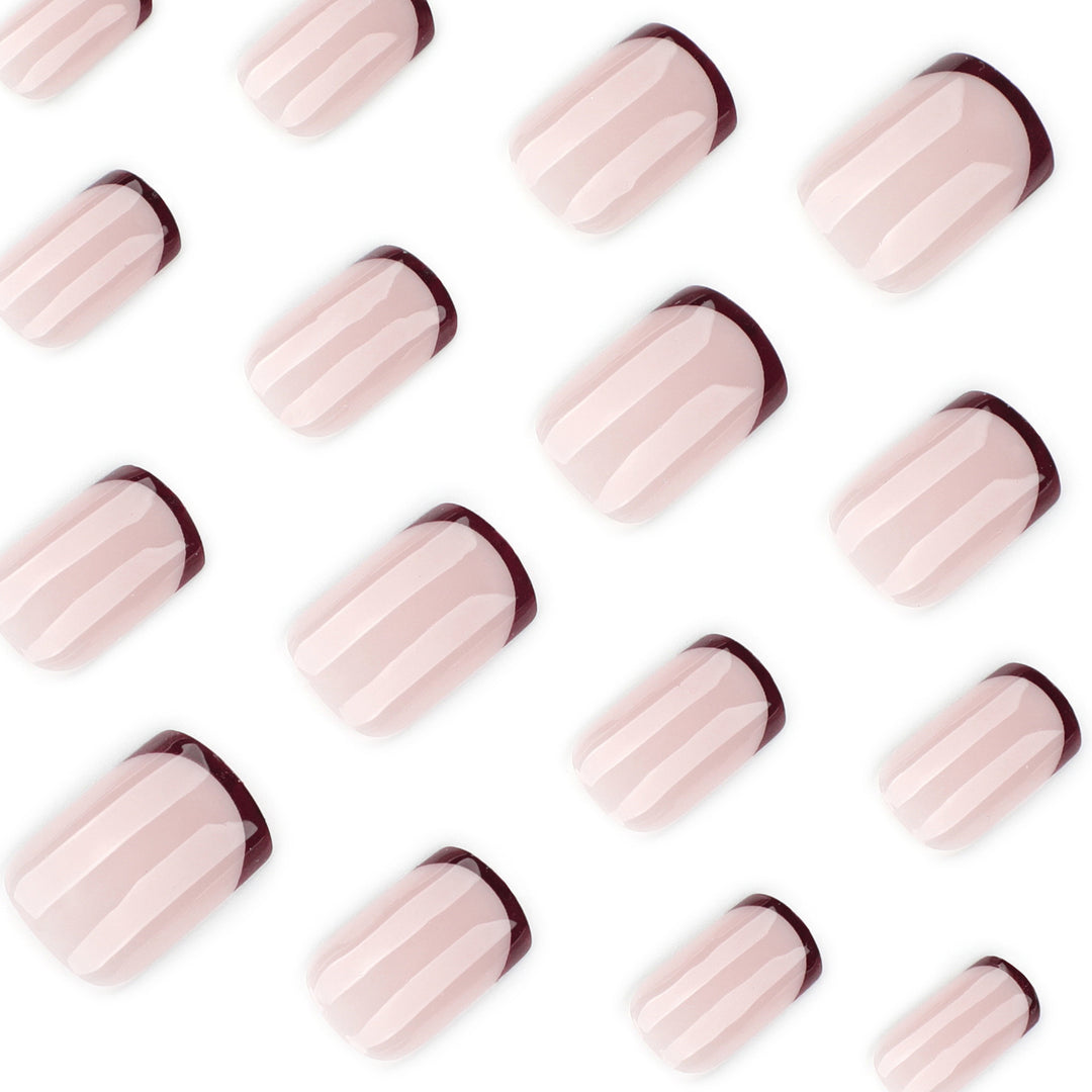 Artful nail design with elegant French tip and glossy finish Kalsten