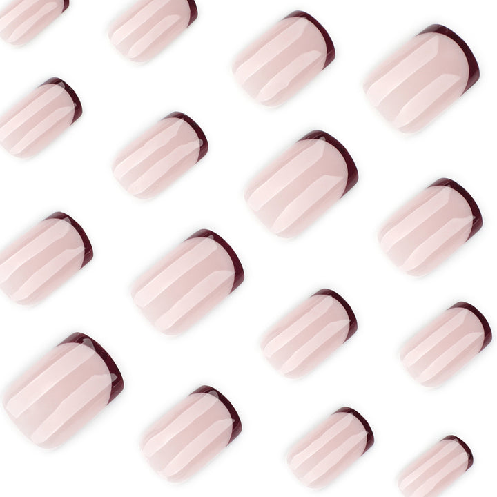 Artful nail design with elegant French tip and glossy finish Kalsten