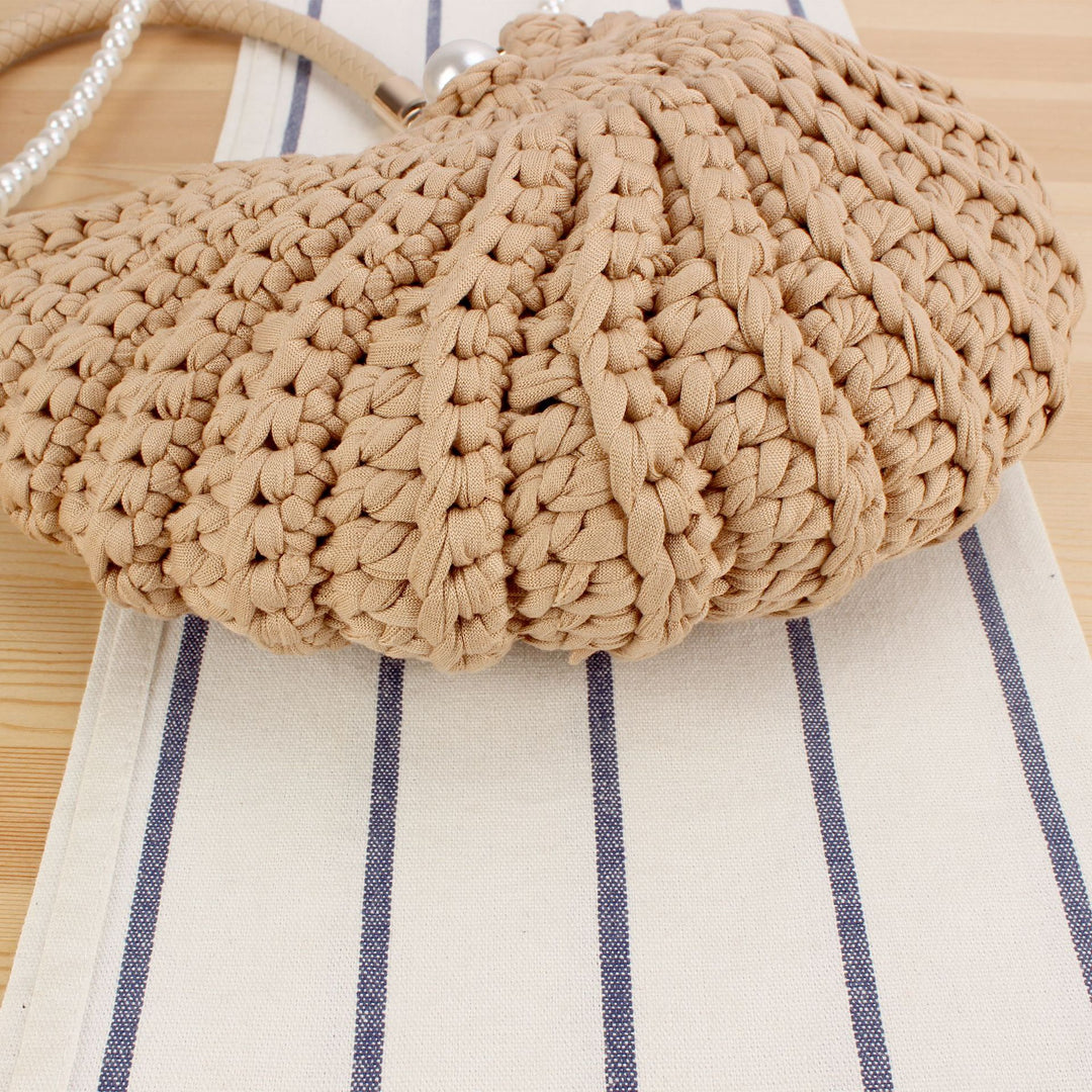 Evening bag with pearl decorated handle Kalsten