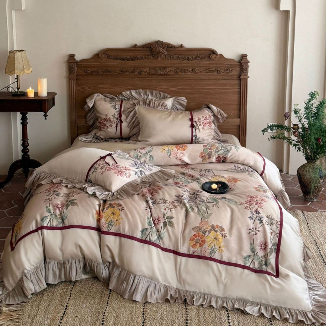 Romantic satin bedding set with ruffles, floral embroidery and reversible function