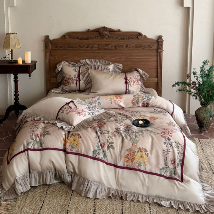 Romantic satin bedding set with ruffles, floral embroidery and reversible function