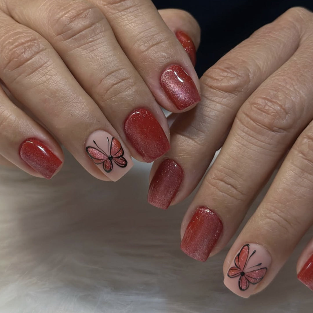 Artistic nail design with butterfly motifs Kalsten