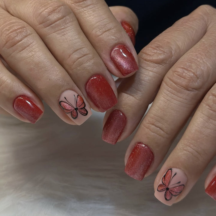 Artistic nail design with butterfly motifs Kalsten
