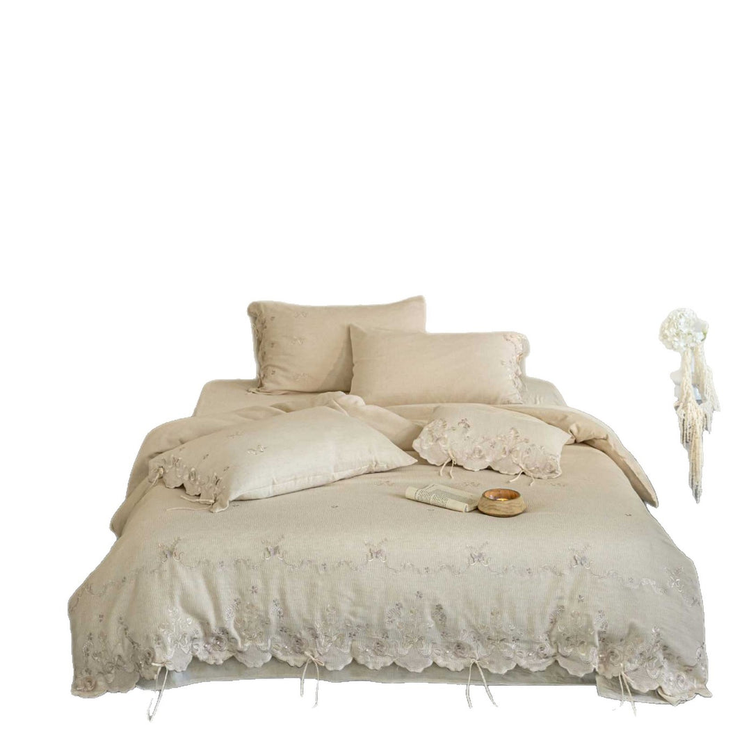 Luxurious embroidered linen bedding set with lace edge