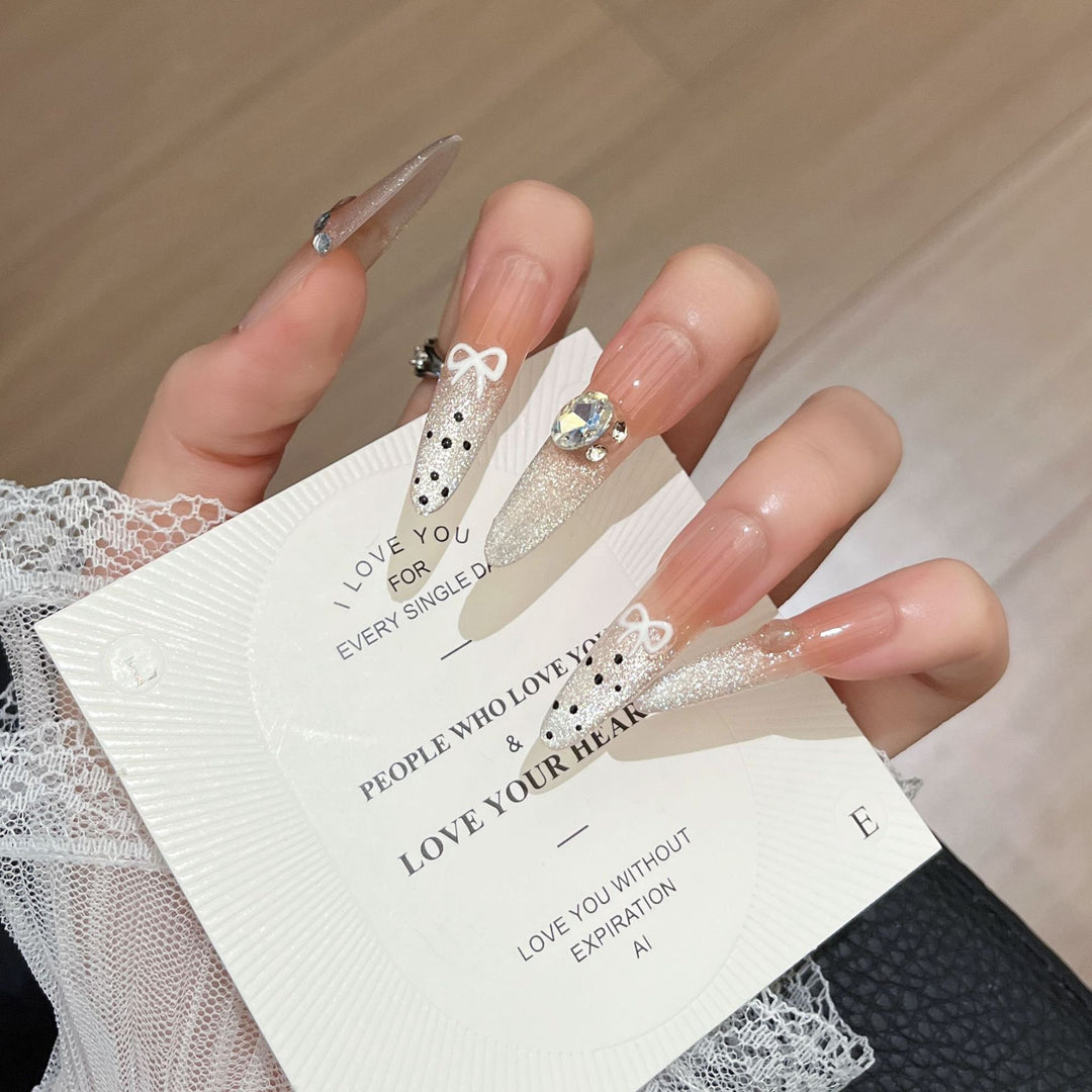 Artistic Stiletto Press-On Nail Art with Glimmering Accents Kalsten